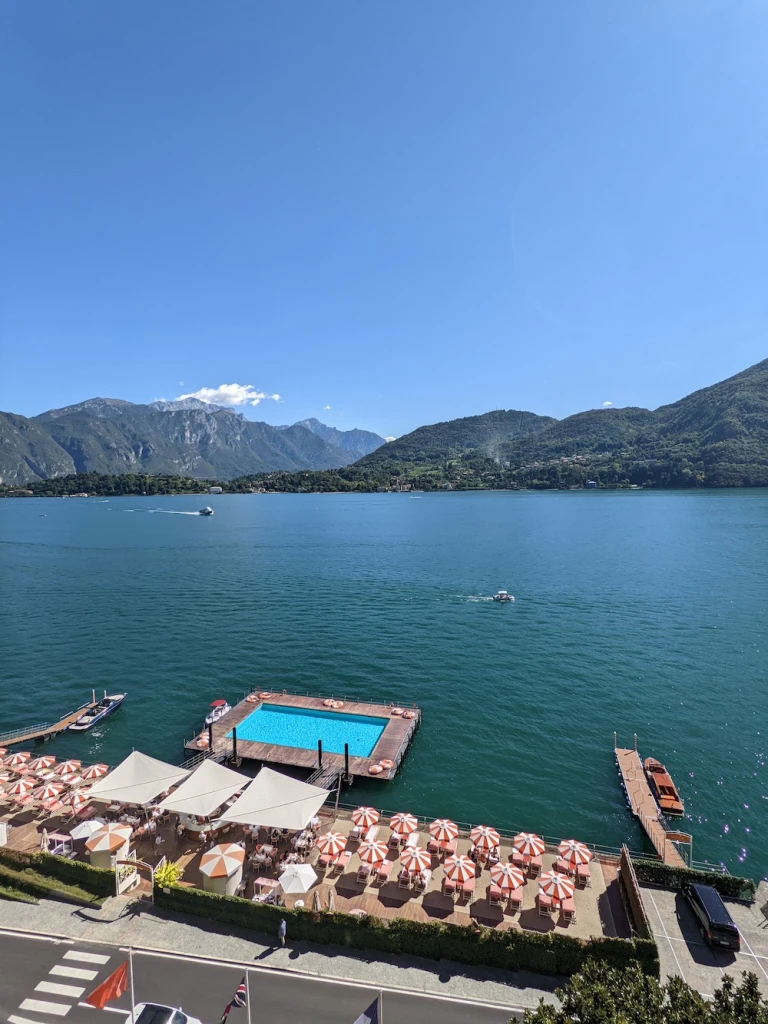 A view of Lake Como, Italy and the floating pool from Grand Hotel Tremezzo. 